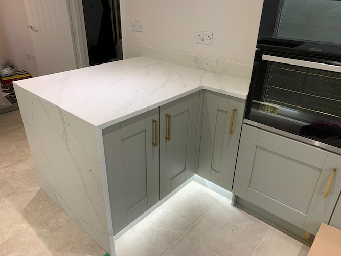 30mm Calacatta Unico with mitred end panel front view