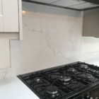 Unistone Misterio Gold cooker backsplash
