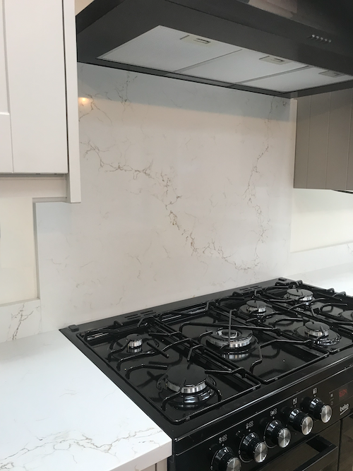 Unistone Misterio Gold cooker backsplash